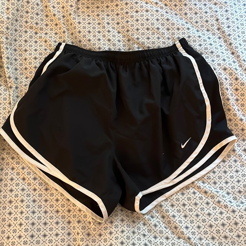 Black Nike running shorts